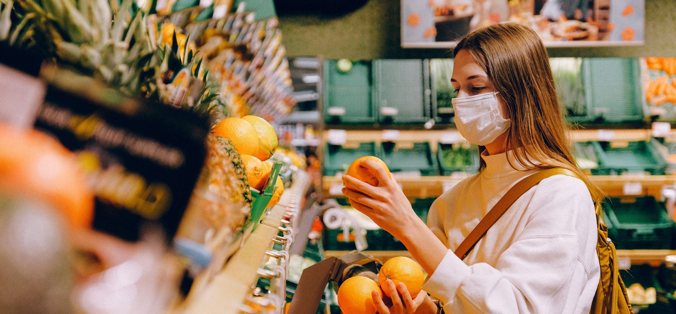 woman wearing mask in supermarket 3962294 scaled