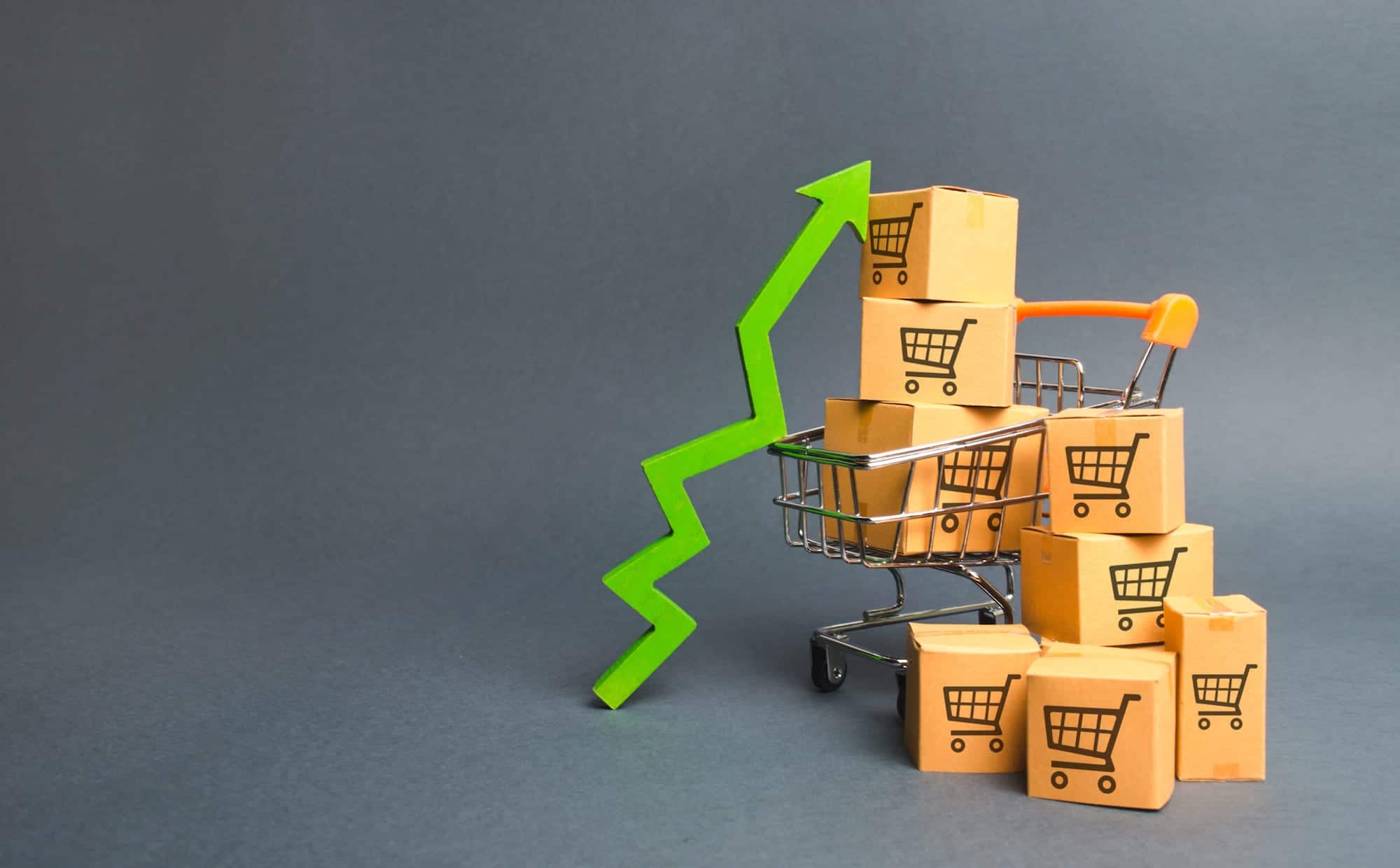 shopping cart with cardboard boxes with pattern trading carts green up arrow