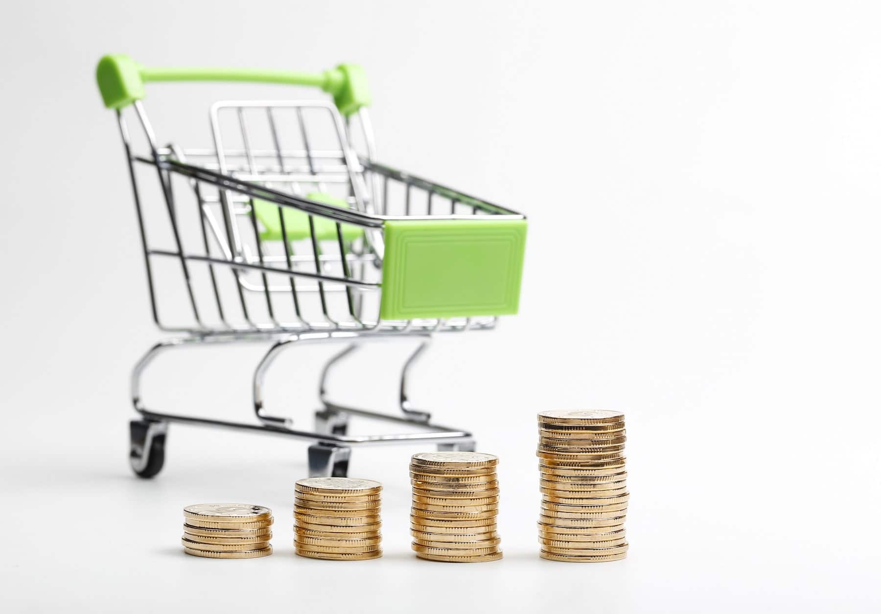 coins pile shopping cart white background min